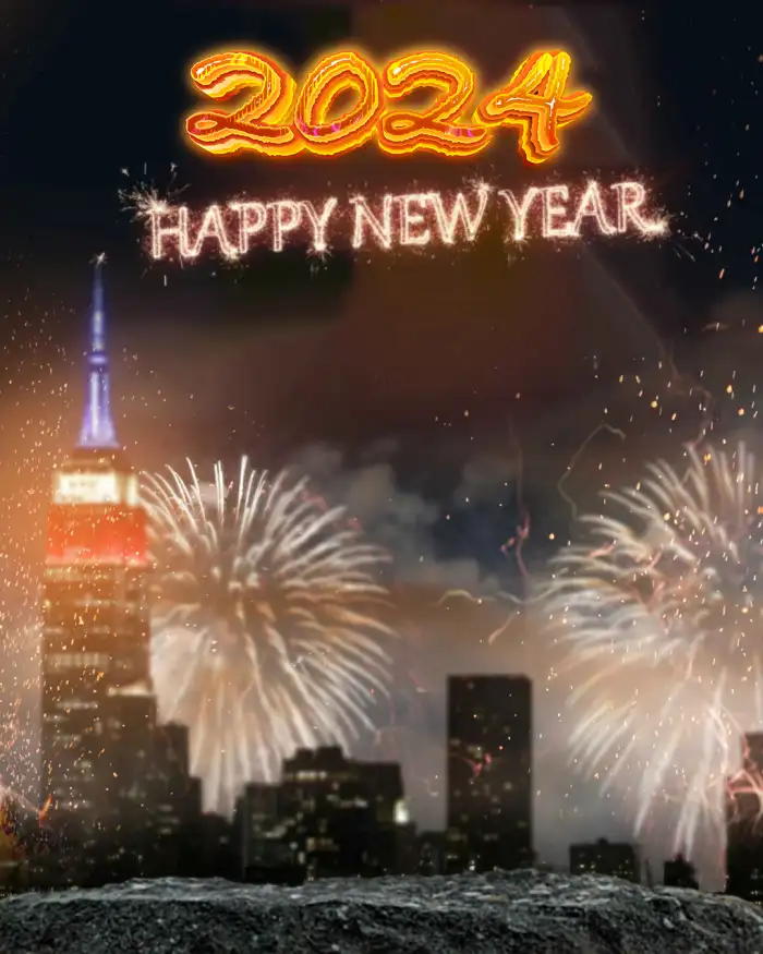 2024  Happy New Year Lighted Tower With Fireworks In The Sky Background