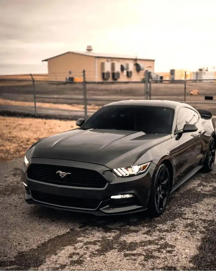 Black Car Parked In Front Of A Building         Background Free