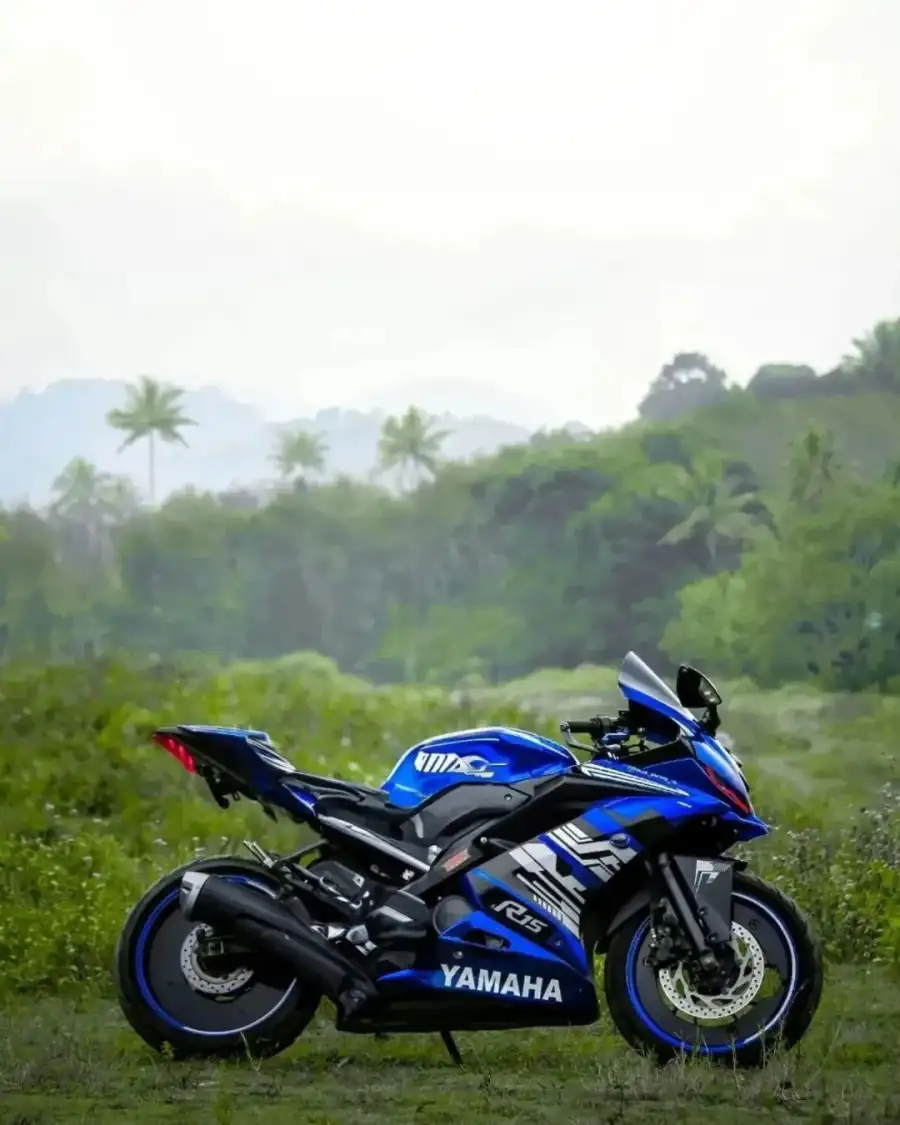 CB Blue Bike Motorcycle Parked In A Field Background