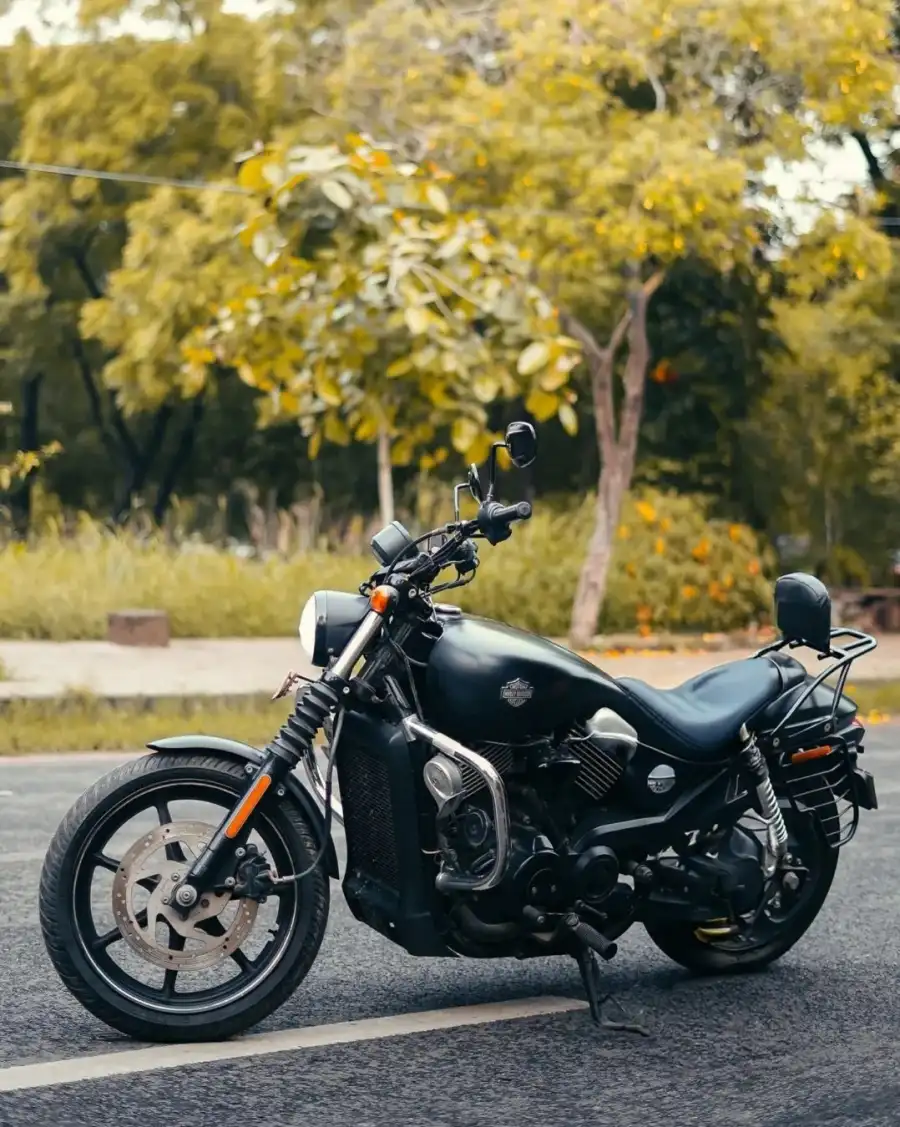 CB Motorcycle Parked On The Side Of The Road Background