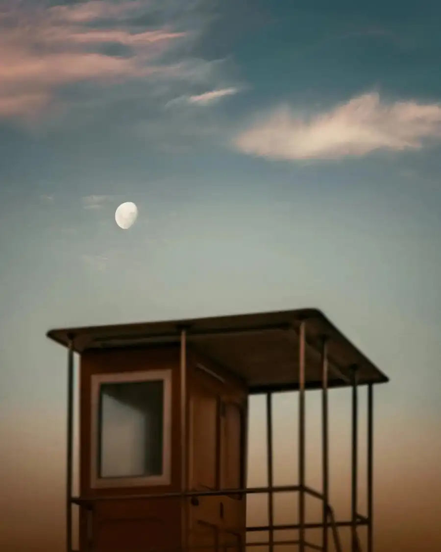 CB Small Wooden House With A Moon In The Sky Background