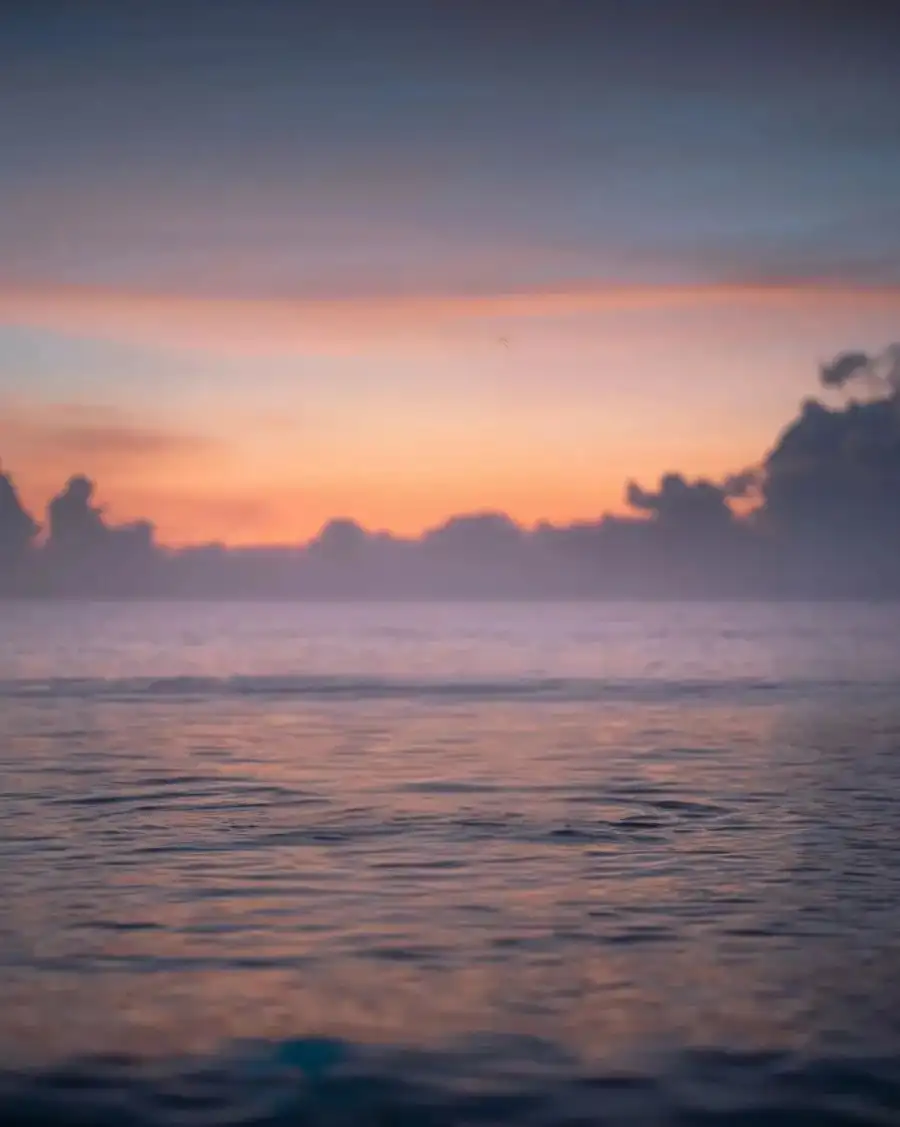 CB Sunset Over A Body Of Water Background