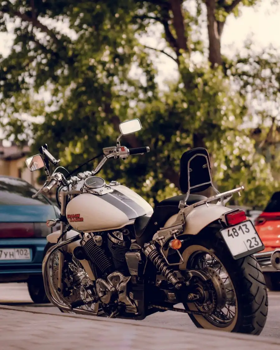 CBotorcycles Parked On The Side Of The Road Background