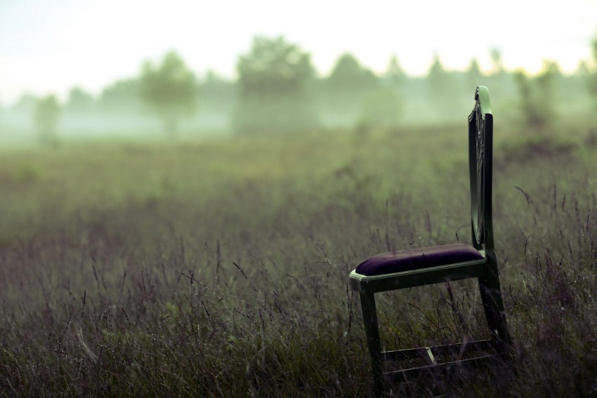 Chair In Grass Background Wallpaper Full HD