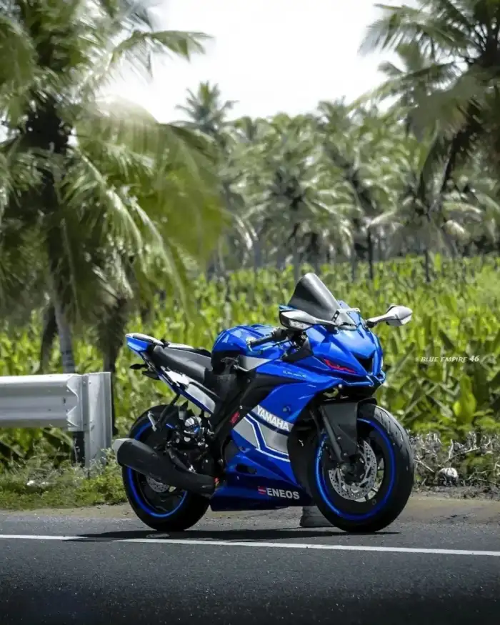 Editing Blue Motorcycle Parked On The Side Of A Road Background