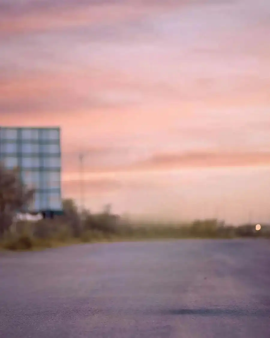 Editing Building With A Sunset In The Background     Background