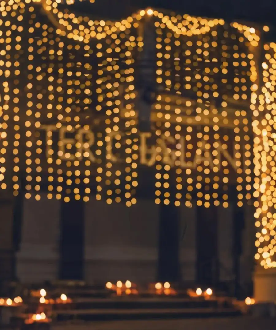 Editing Building With Many Candles In Front Of It Background