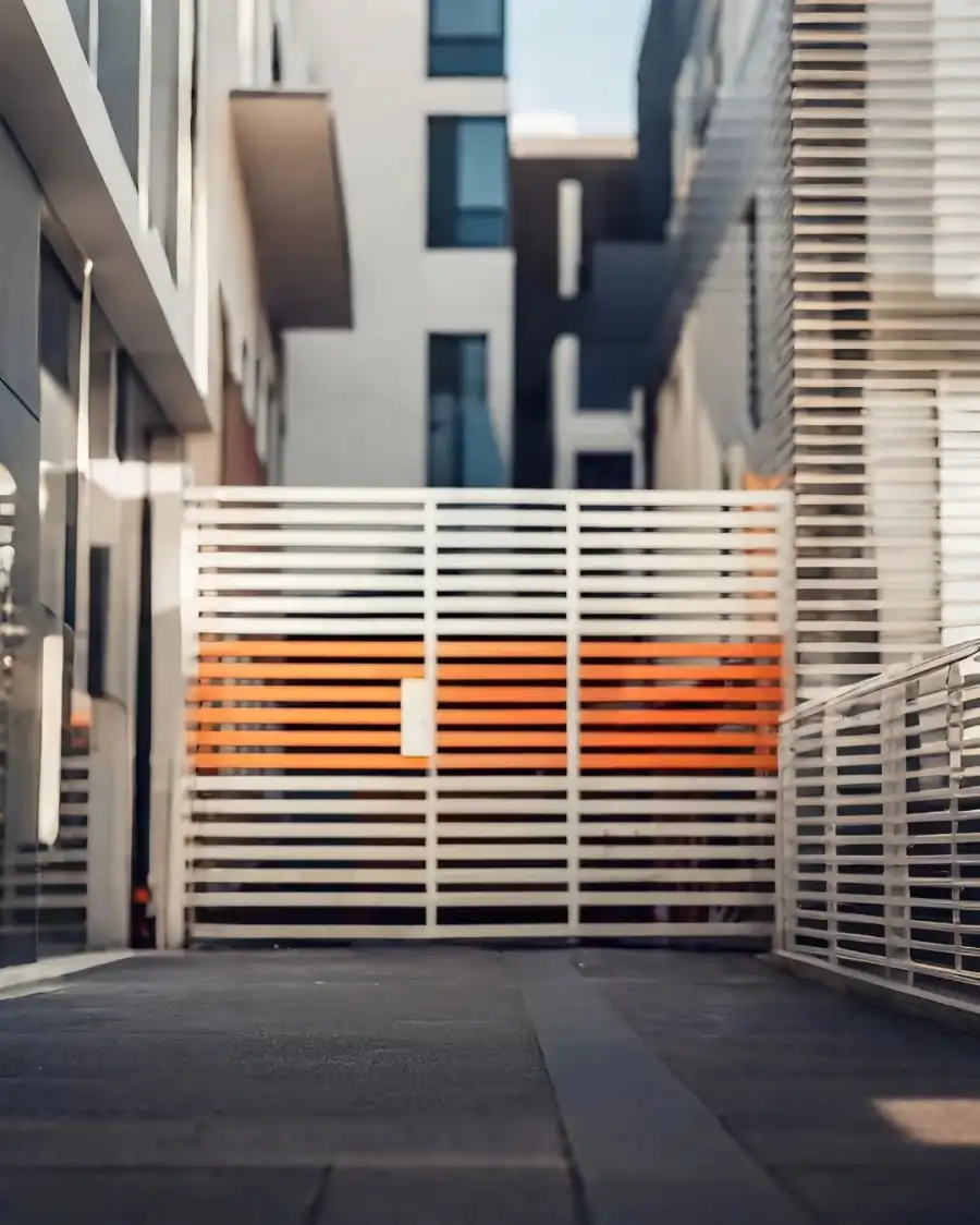 Editing Metal Gate In Between Buildings Background