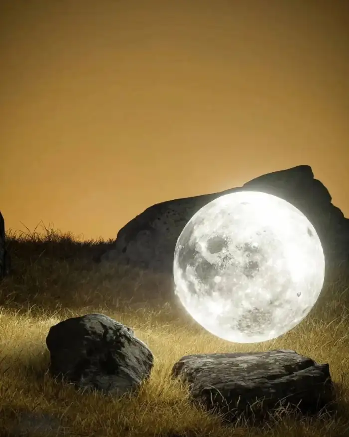 Editing Moon Over A Rock Background