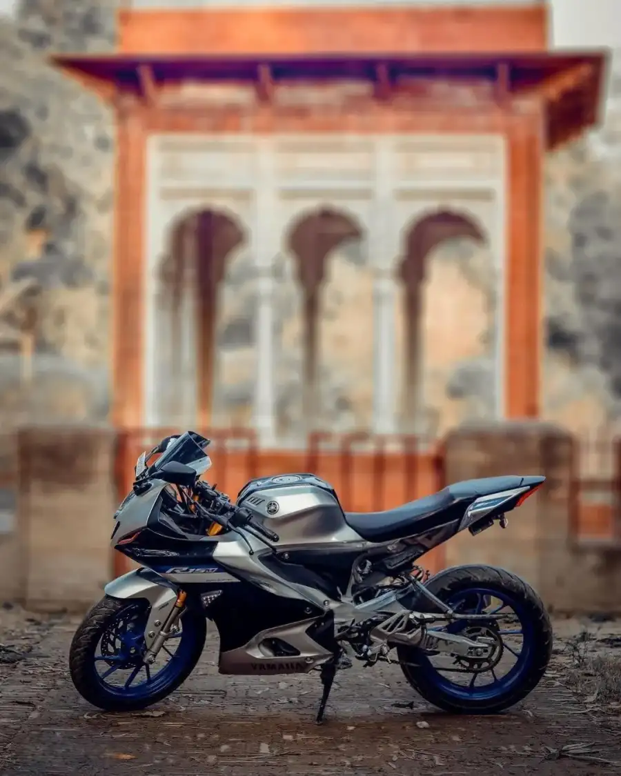 Editing Motorcycle Parked In Front Of A Building Background