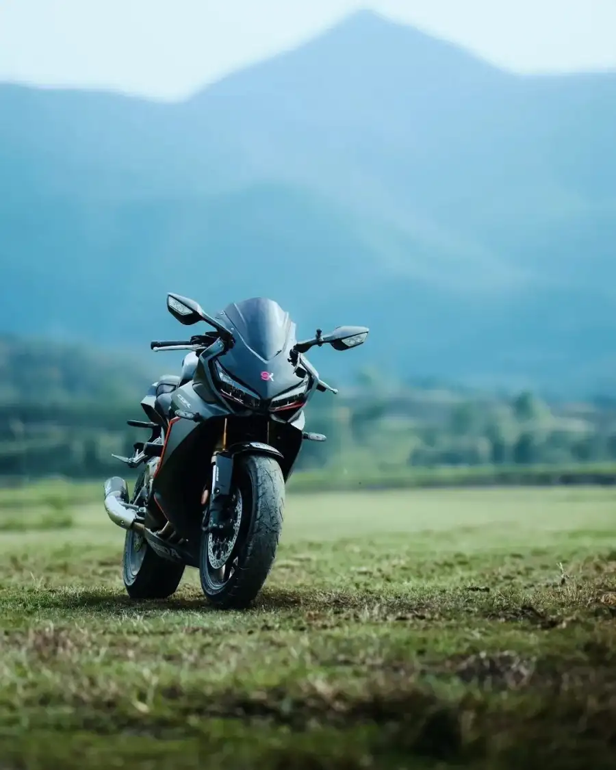 New Photo Editing Motorcycle Bike Parked In A Field Background