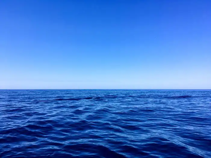 Ocean Water With Blue Sky Background HD Images