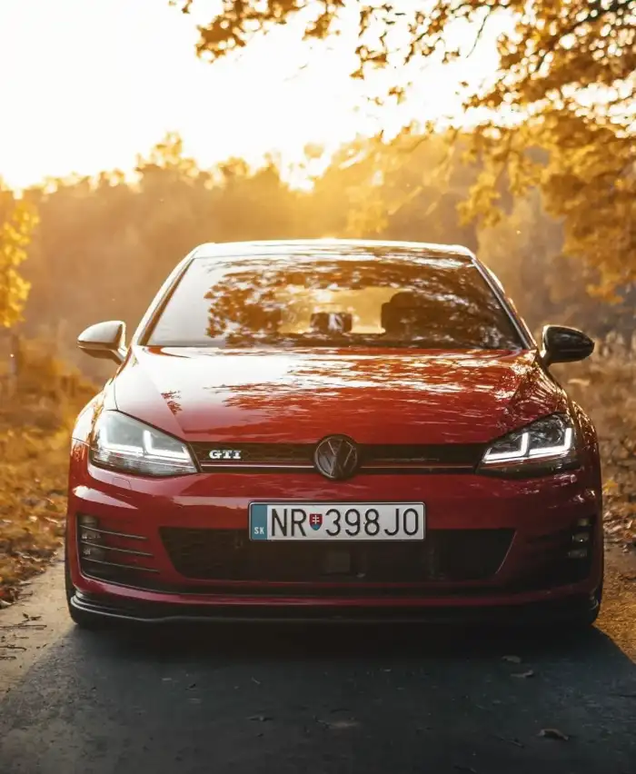 Photo Editing Red Car Parked On A Road Background