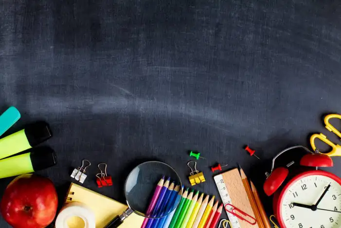 School Stack Of Books And Pencils On A Table Background