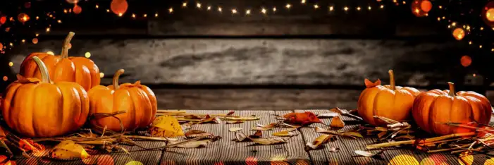 Thanksgiving Pumpkins And Berries Food On A Wood Surface Background