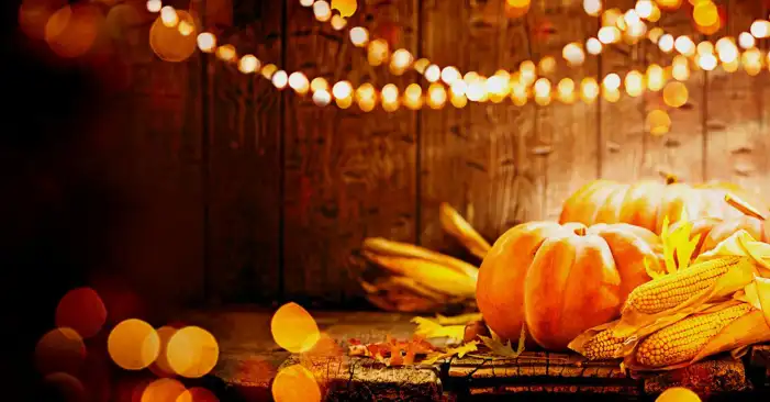 Thanksgiving Pumpkins And Berries On A Wood Surface Background