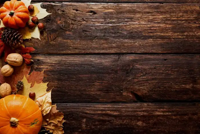 Thanksgiving Pumpkins And Berries On A Wood Surface Background