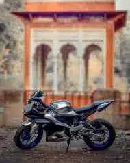 Editing Motorcycle Parked In Front Of A Building Background